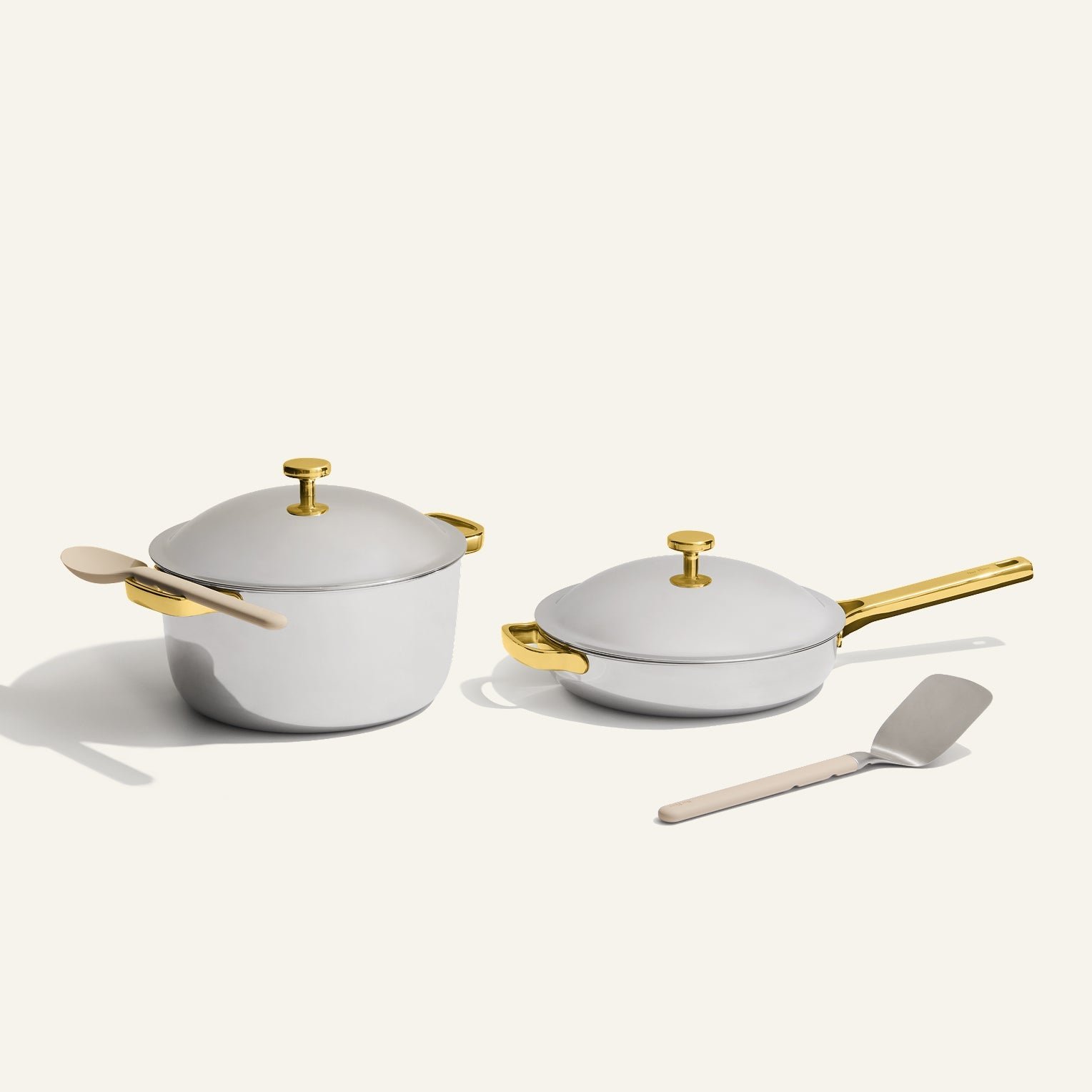 our-place-product-thumbnail-TitaniumProCookwareDuo-AlwaysPan-PerfectPot-6pieces-gold Titanium Pro Cookware Duo - Image 1