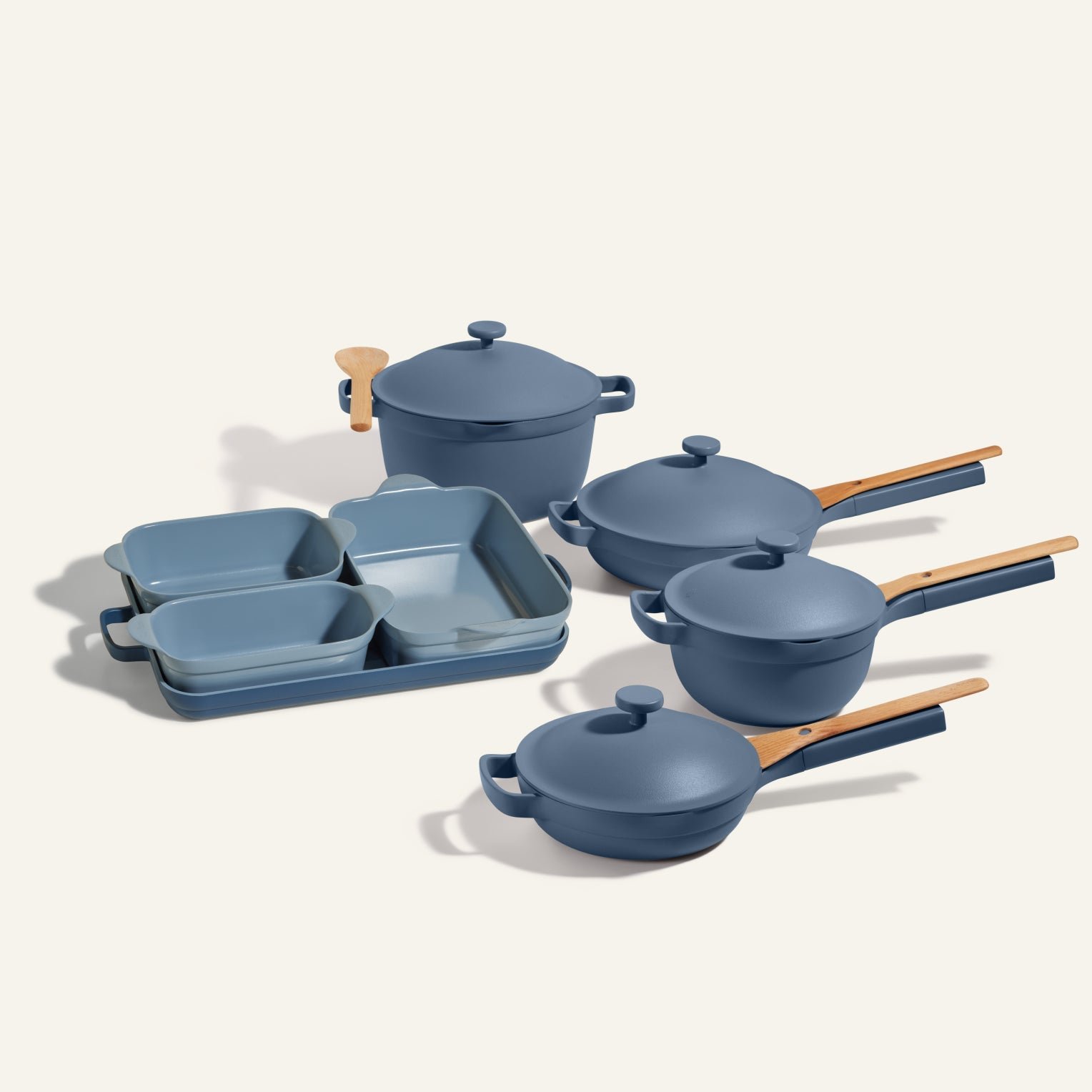 our-place-product-thumbnail-ultimate-cookware-set-always-pan-perfect-pot-mini-griddle-bakers-pan-blue-salt Cookware + Bakeware Set - Image 1